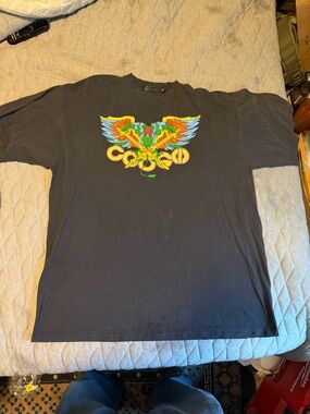 COOGI Black Short-Sleeve Tee with Vibrant Eagle Graphic